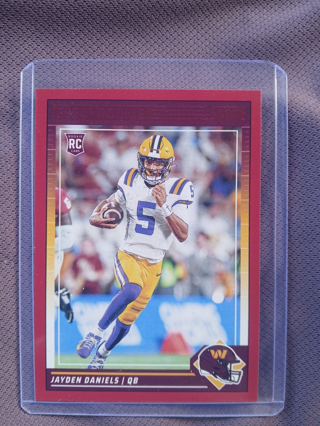 2024 Score Rookies Jayden Daniels #302 (RC) Red Parallel