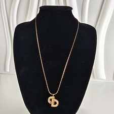 Christian Dior Gold-Finish Metal Necklace with a Crystal-Embellished CD Logo