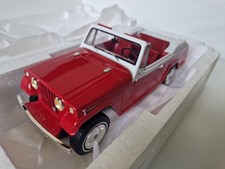 BOS MODELS 1:18 JEEP JEEPSTER COMMANDO ROT