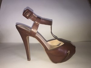 silver and black heels