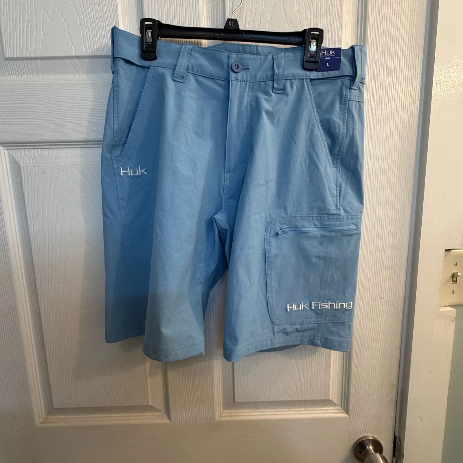 Huk Next Level 20" Performance Fishing Shorts Light Blue Size L Summer Lake Life
Opens in a new wind