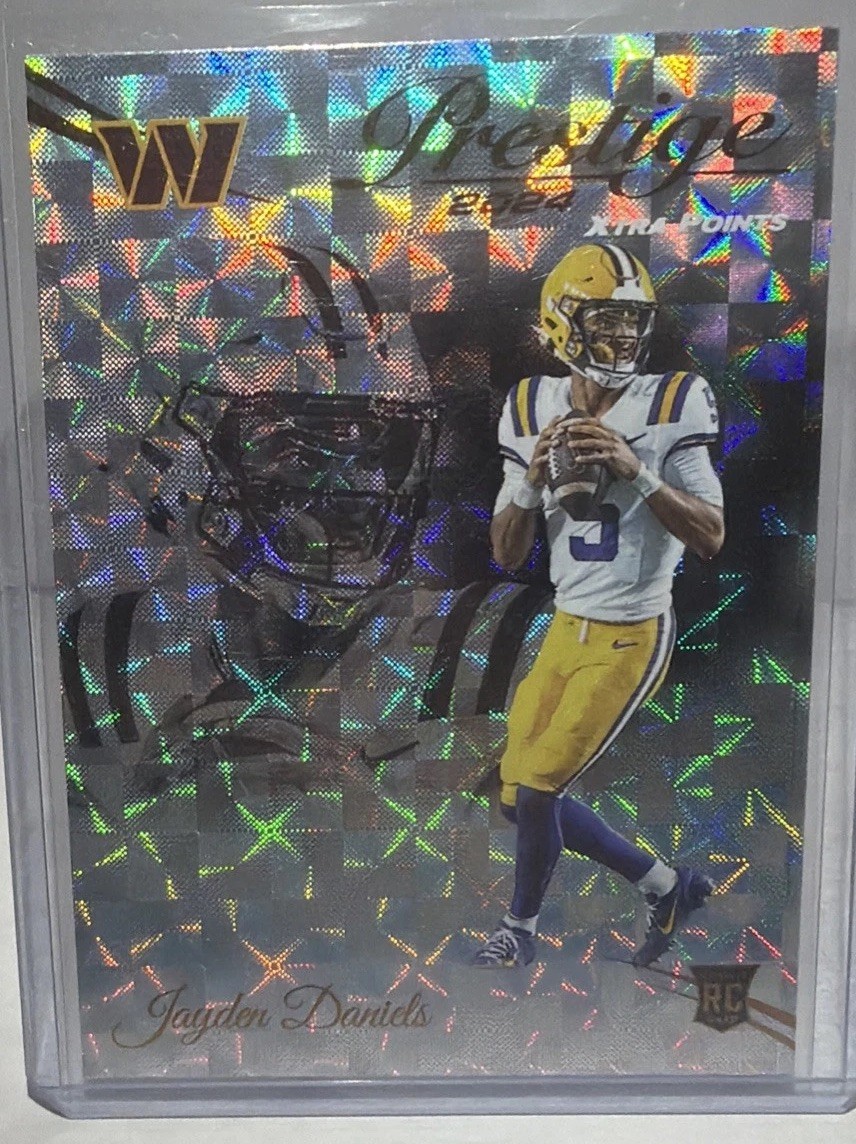 2024 Panini Prestige - Rookies Jayden Daniels #302 Xtra Points Hyper (RC)