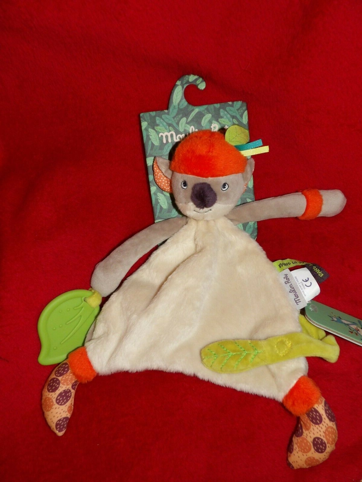 Doudou plat Koala Dans la Jungle beige orange vert, peluche plate naissance de la marque Moulin Roty