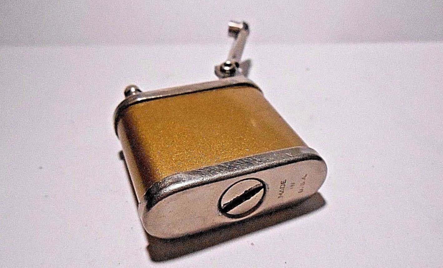 VINTAGE LIFT ARM FLUID GOLD & CHROME USA CIGARETTE LIGHTER - KLIX IS KLICKIN' 