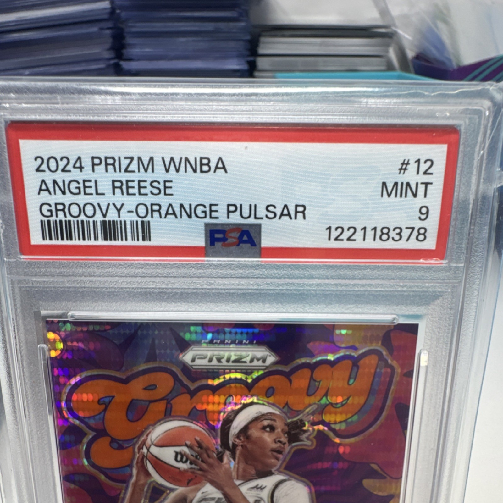 2024 Panini Prizm WNBA Angel Reese Groovy Orange Pulsar Rookie /75 #12 RC PSA 9 view 2