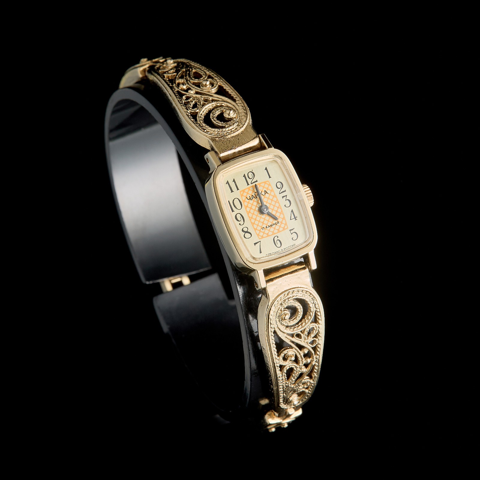 Small women's cocktail watch with gold color. Vintage women's mechanical watch.