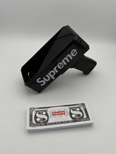 Supreme Money Gun In Black Super Rare and Comes with Supreme Cash