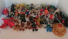 Hasbro Imaginext Gran Lote de más de 35 Piezas Marvel DC Comics Star Wars Cavemen y Más