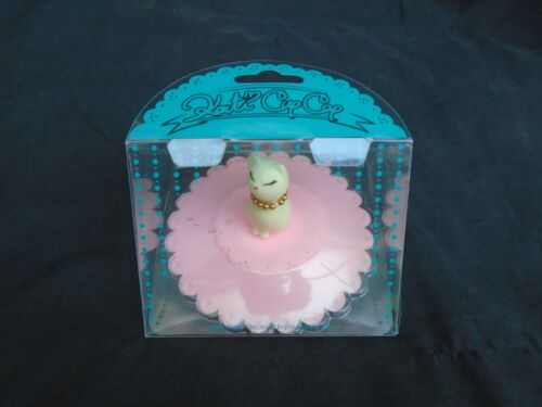 Copertura tazza Kati in silicone di Thinkinge Cup/copertura in vetro gatto bianco su base rosa. - Foto 1 di 4