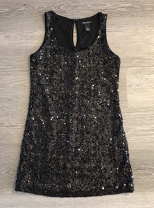 black sleeveless sequin dress