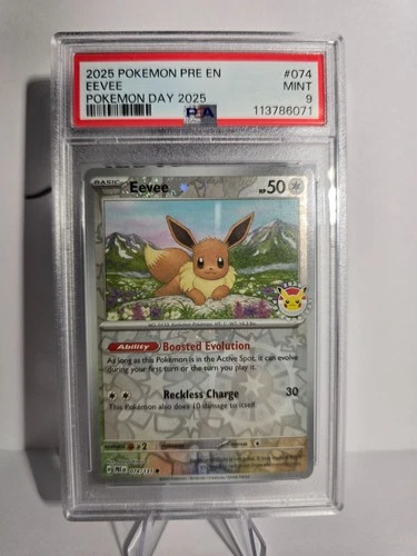 PSA 9 Eevee - (Pokemon Day 2025) (Reverse Cosmos Holo) 074/131