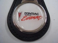PONTIAC WE BUILD EXCITEMENT   KEY CHAIN   LEATHER FOB  FREE SHIPPING