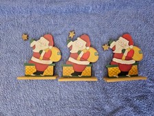 Weihnachtsdeko, Weihnachtsmänner, Kerzen und Schlitten aus Holz