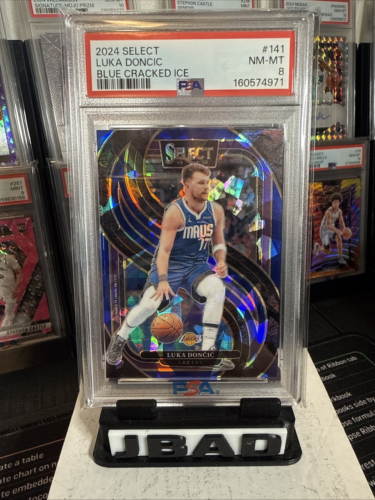 2024-25 Panini Select #141 Luka Doncic Blue Cracked Ice Prizm PSA 8 view 5
