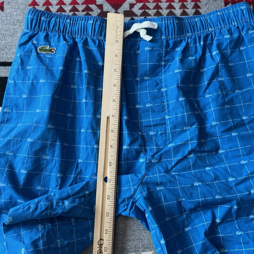 Pantalones cortos para dormir Lacoste para hombre medianos con estampado de logotipo azul bolsillos para salón C6 Foto 4 de 4