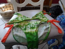 Girls size xlarge green and orange flower 2 piece bathing suit from xhilaration