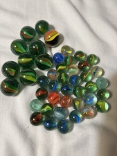 Lot of vintage cat eye marbles plus more Large and Small, green red blue
