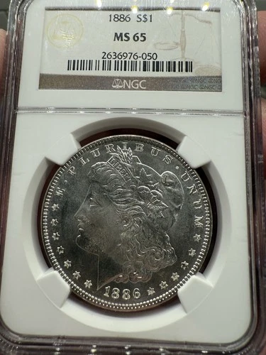 NGC. 1886 S$1 Morgan Silver Dollar  MS 65