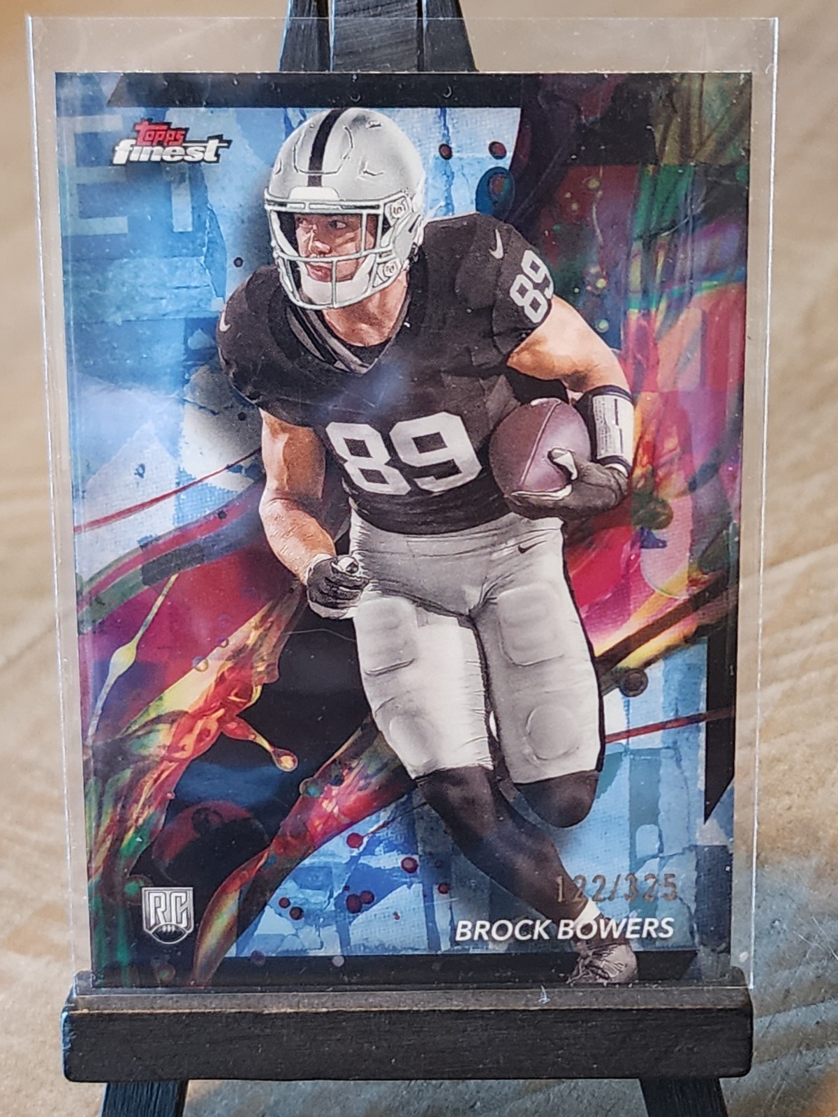 2024 Topps Finest - Common Brock Bowers #82 Sky Blue Refractor /325 (RC)