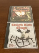 Lot Of 2 Factory Sealed Christmas CDs: Sleigh Ride Songs & Fireside Christmas