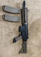 Tippmann TMC Paintball Marker w/ Paint and Masks