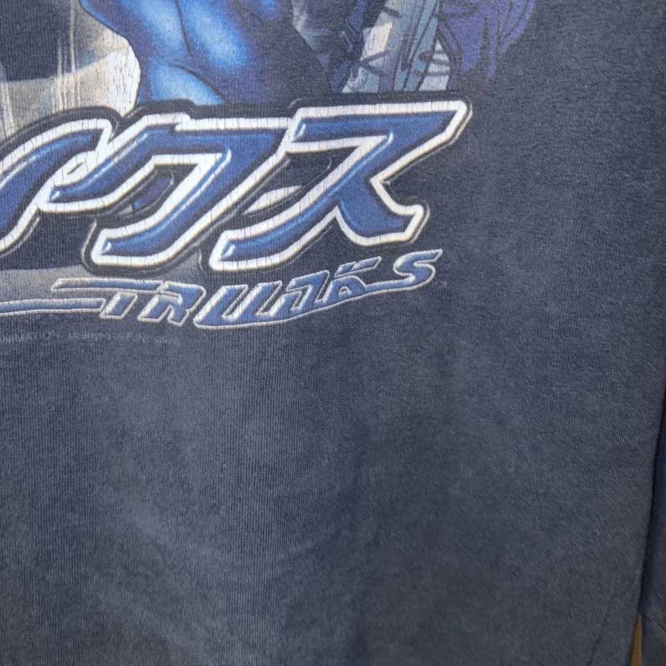 Camiseta Dragonball Z L era 2000-2004. Camiseta Trunks Anime Vintage Fatigada Desteñida Foto 4 de 4