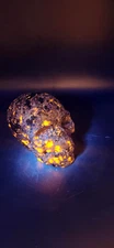 Flame stone "yooperlite" skull! 3 inches tall, 3 long, 14 ounces