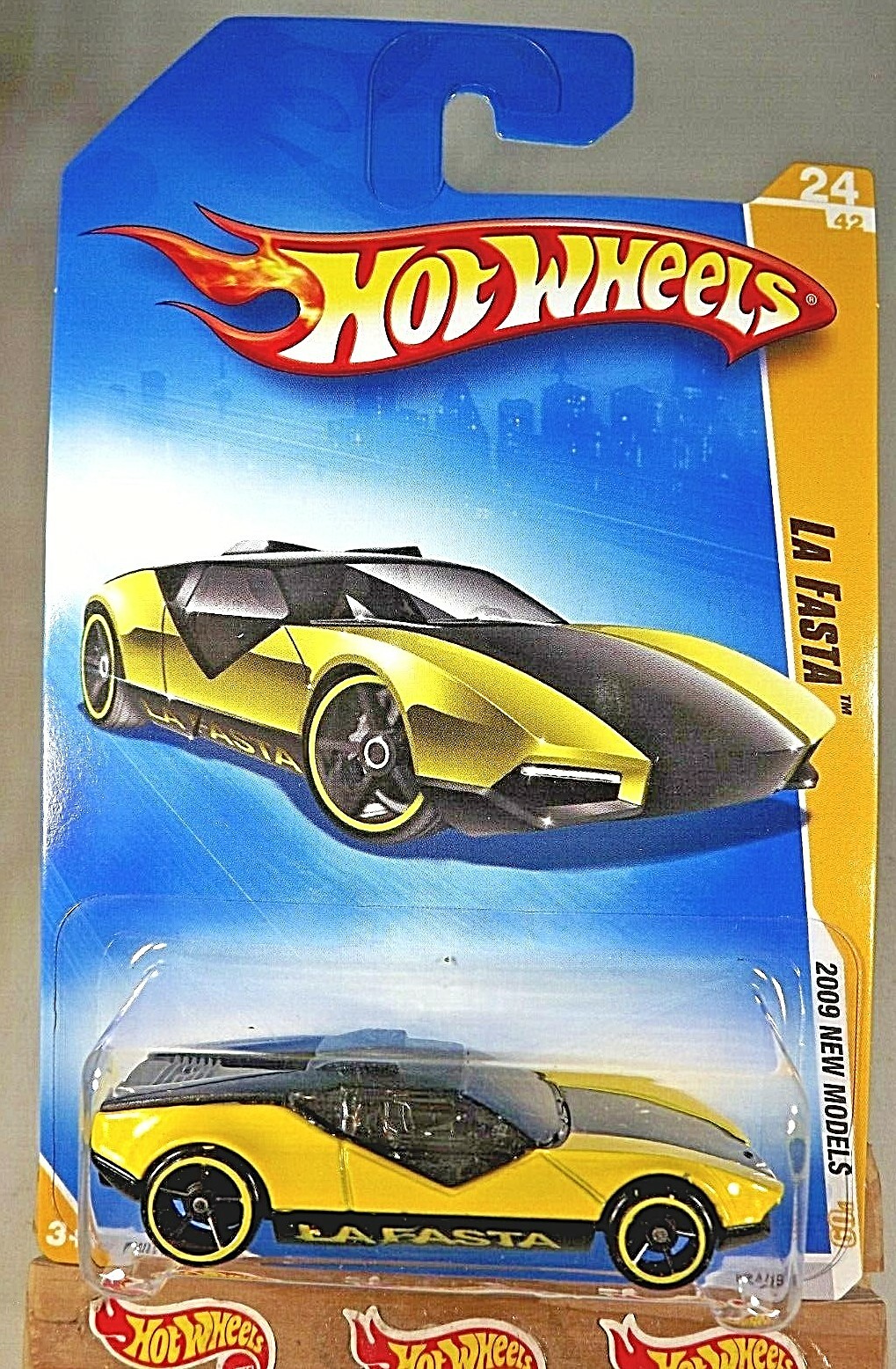 2009 Hot Wheels #24 New Models 24/42 LA FASTA Yellow Variant w/Black OH5 Spokes