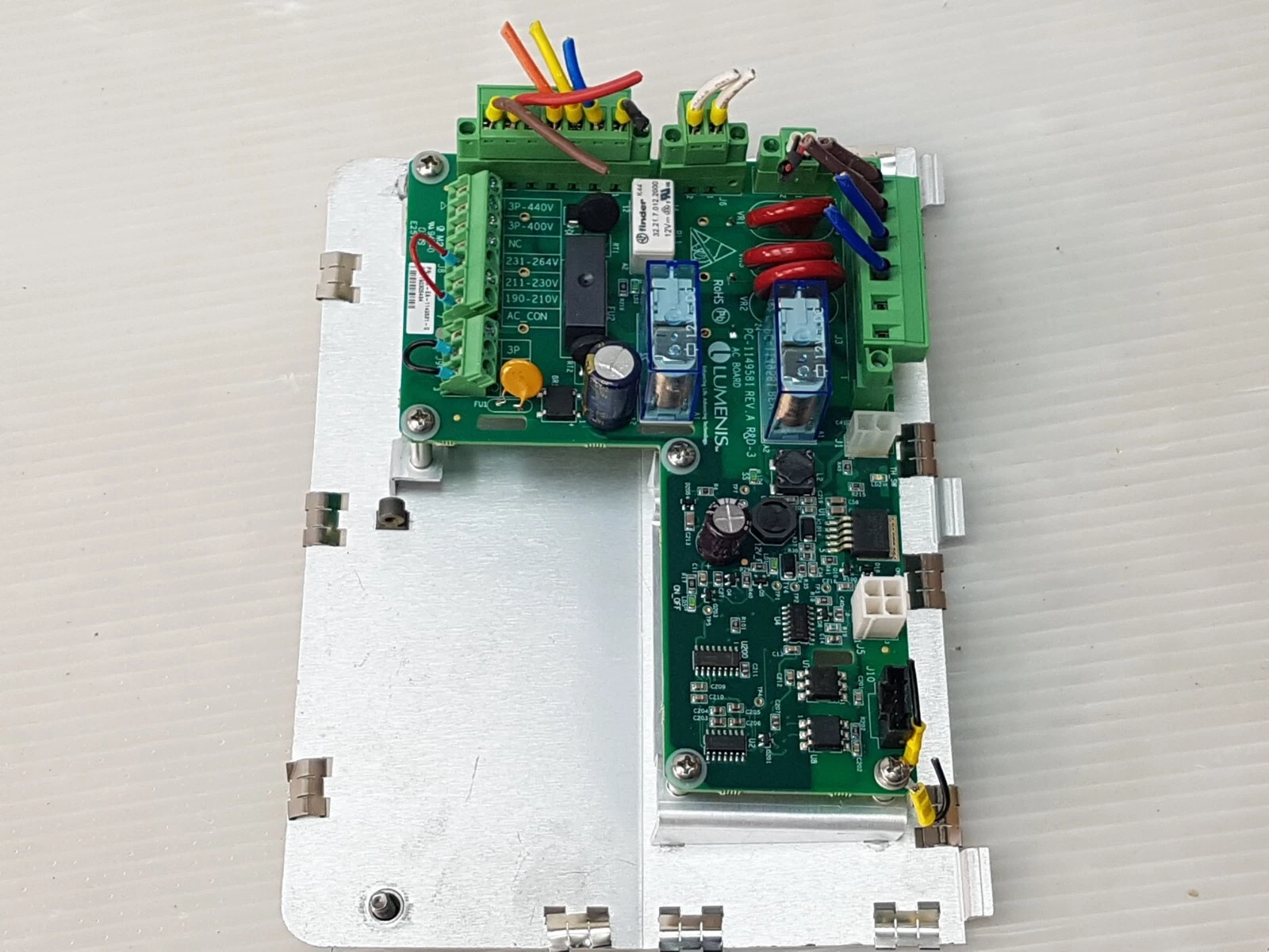LM-EA-1149581-G AC board assembly rotated, showing the terminal blocks and relays