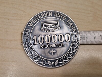 Original Vintage Firmenzeichen GOLIATH Plakette 100.000 km 