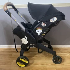 Doona+ Convertible Stroller & Car Base Nitro Black and Lots Of Extra Accessories