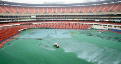 General view of the rain soaked turf during a rain delay of a Pi- 1984 Old Photo