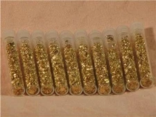   GOLD FLAKES IN 12 GLASS VIALS  NO LIQUID