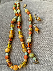 Vintage set of jewelry different colors shapes of precious stones necklace brace