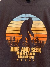 NWOT - HIDE AND SEEK Montana Sasquatch Bigfoot Image Adult M Short Sleeve Tee