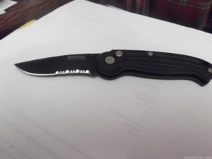 Boker Magnum  BLACK handles...........Button Lock. APPROX 3"  GREAT GIFT ** B117