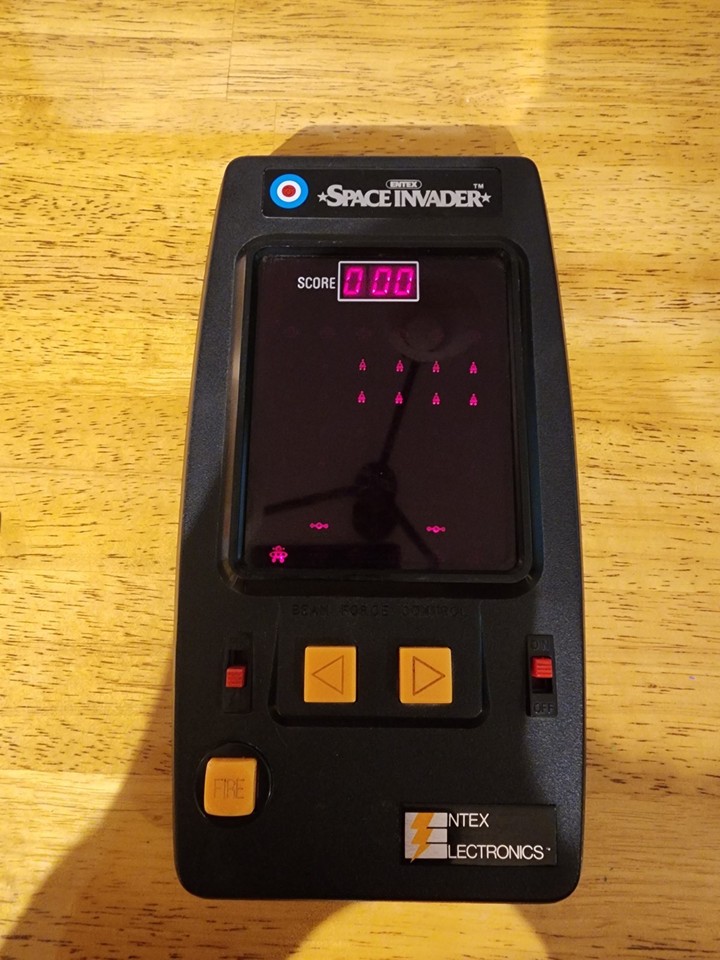 A genuine 1980 Entex Space Invaders handheld MADE IN JAPAN — this is early LCD gaming history at its finest, a true collector's piece from the arcade invasion era.