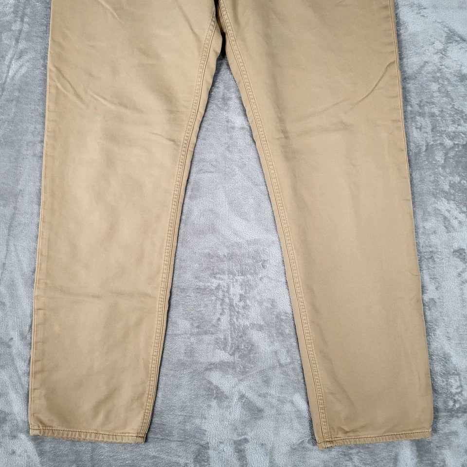 Pantalones Banana Republic para hombre 38x34 (se adapta a 38x32) Traveler calce ajustado caqui elástico Foto 3 de 4