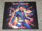 ELVIS PRESLEY "THE ROCKIN ROOTS OF" U.K. IMPORT LP PRESSED ON BLUE VINYL