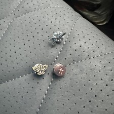 Three Suit Badges 
