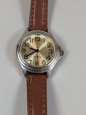Gold Dial Ladies watch with silver case and with brown leather band