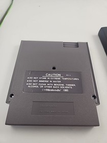 Custodia cravatta Total Recall Nintendo NES videogioco film d'azione