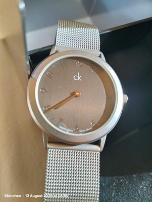 Calvin Klein Swiss Made Armbanduhr Milanaise Edelstahl silber Zifferblatt grau