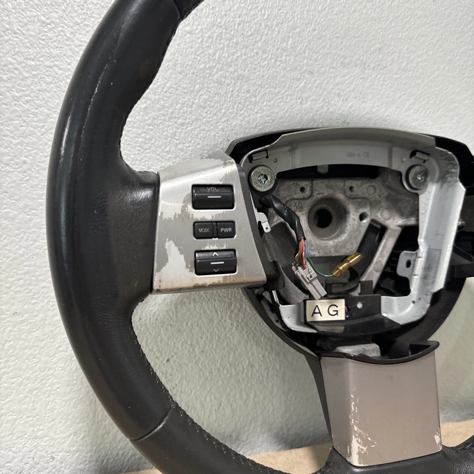 Nissan Murano 2003-2005 OEM volante de cuero con moldura de control negro Foto 2 de 4