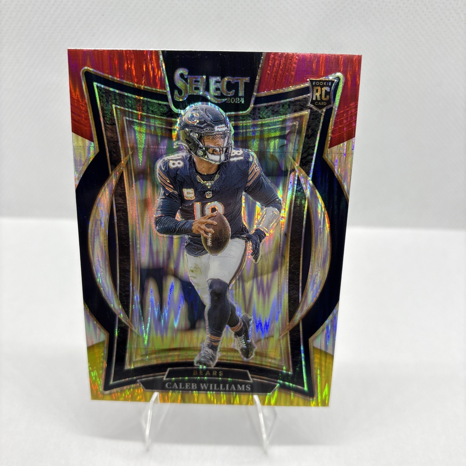 2024 Panini Select - Concourse #25 Caleb Williams Red and Yellow Prizm Shock