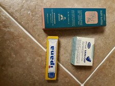 1950's Baby Rattle. Spunky. Davol anti colic and Ipana tooth paste empty boxes