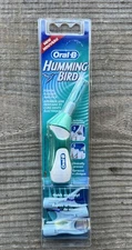 Oral-B Hummingbird Power Flosser w/ 3 Refill Floss Head Picks Sealed New