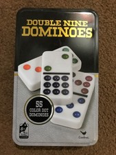 Double nine dominoes in metal tin