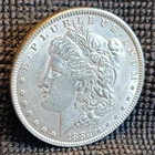 1884 Morgan Silver Dollar - Fineness .90 - AU Condition
