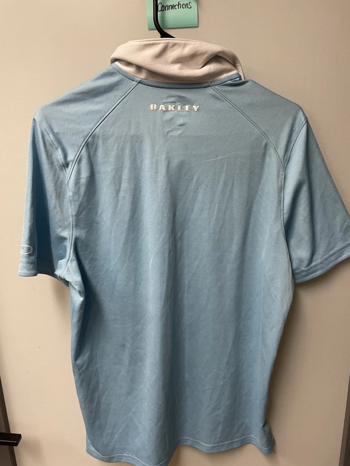 Polo de manga corta Oakley azul claro/blanco para dama - talla XS Foto 3 de 3